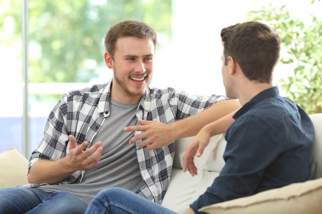 adult man speaking with therapist
