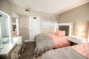 women's bed rooms at luxury rehab