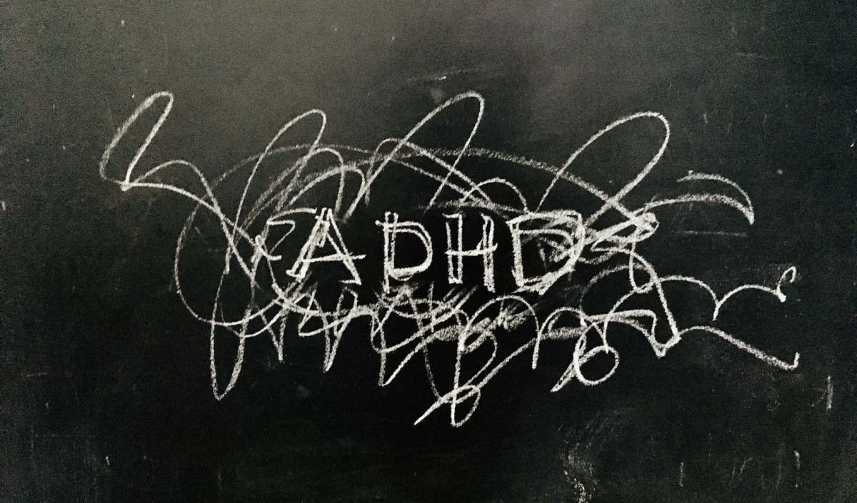 ADHD handwritten on Blackboard